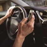 Driver texting while in car