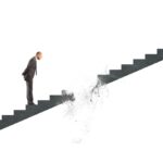 stairs vanish in front of businessman