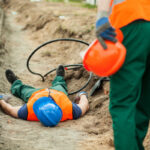 construction worker finds injured coworker by electrical cables